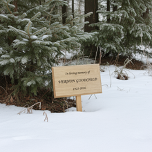 Memorial sign in a snowy forest for Vernon Goodchild