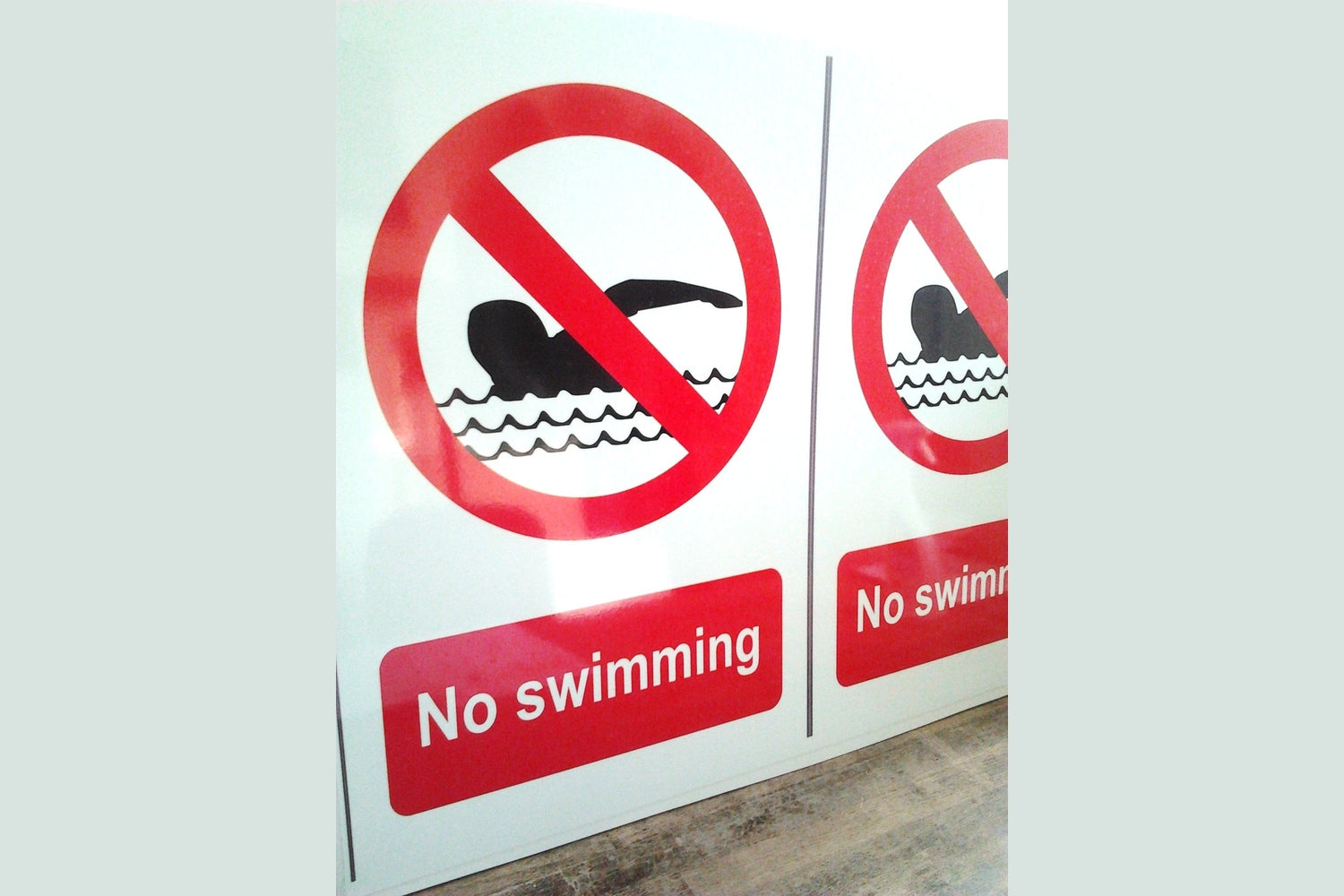 No swimming signs