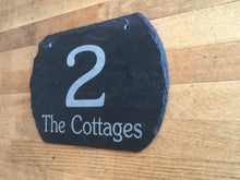 Slate house number sign with '2 The Cottages' with shaped curved edges