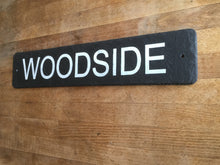 Slate gate sign with white painted lettering