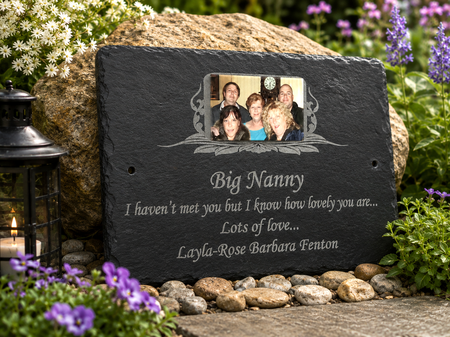 Personalized black slate garden plaque engraved with a photo of a woman and children and the text 'Big Nanny I haven't met you but I know how lovely you are.