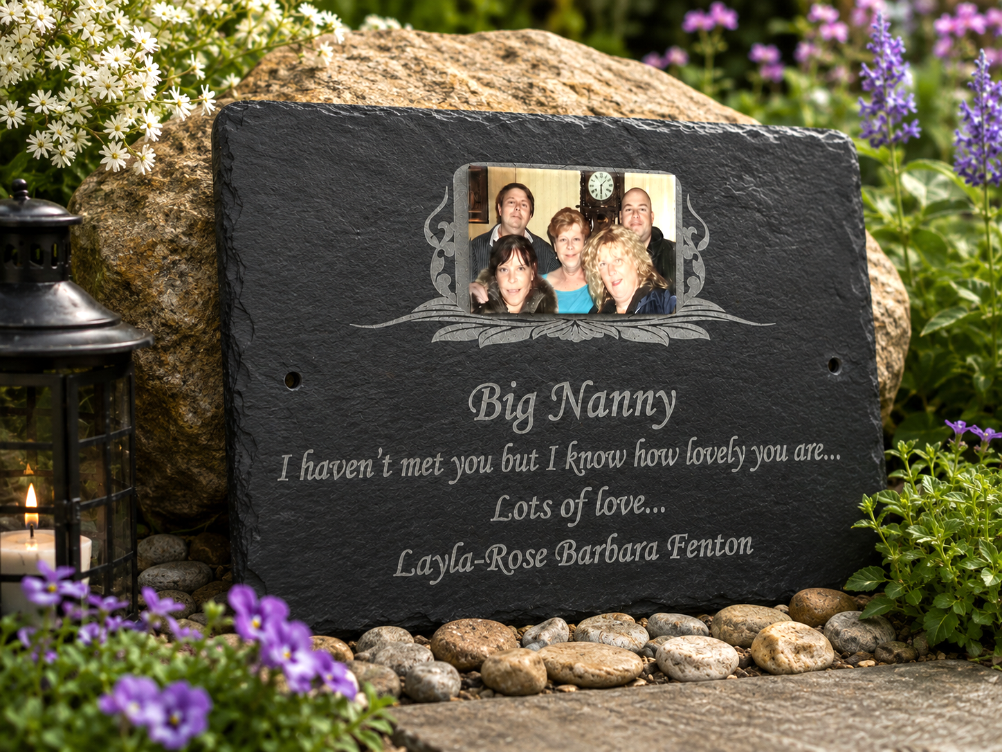 Personalized black slate garden plaque engraved with a photo of a woman and children and the text 'Big Nanny I haven't met you but I know how lovely you are.