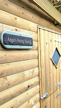 MADE TO ORDER SLATE SIGNS. Potting shed with flowers on the sign.