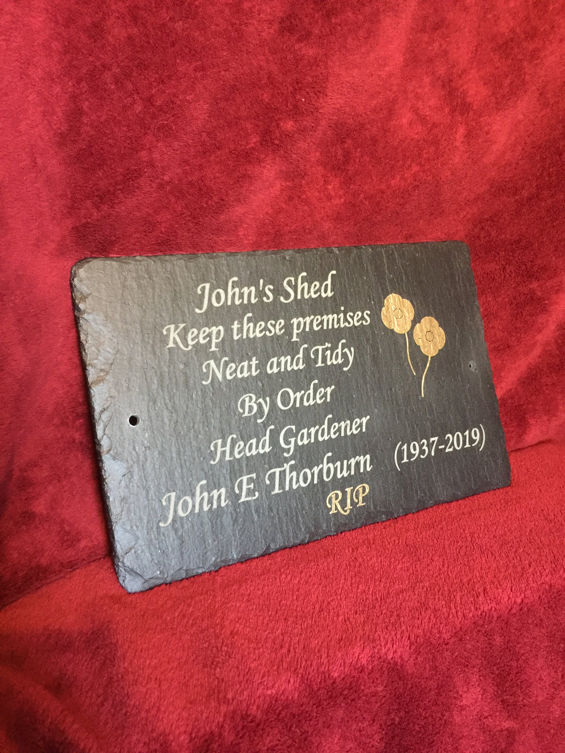 Memorial plaque with poppies