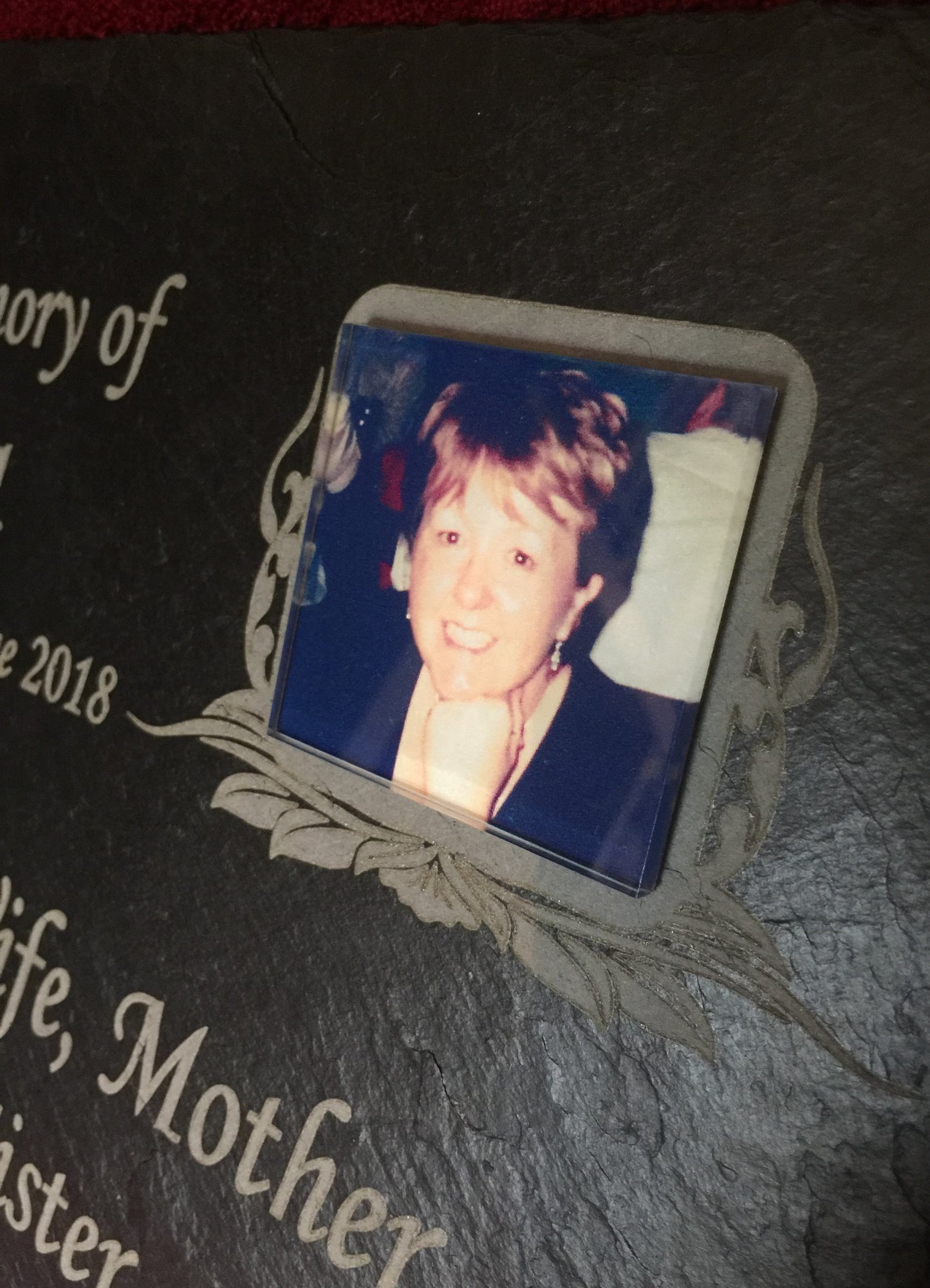 Photo plaque for a persons grave